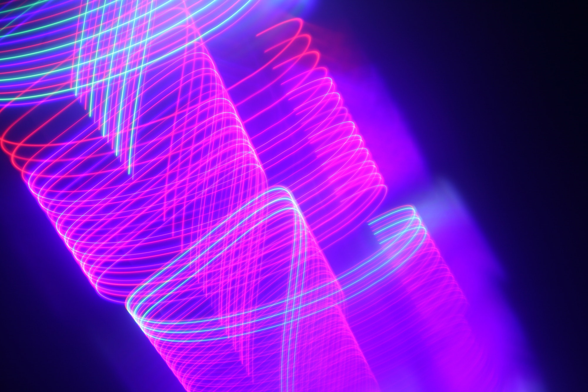 Abstract moving pink and blue neon lights for techno wallpaper or background