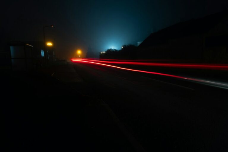 time lapse photography of cars on road during night time