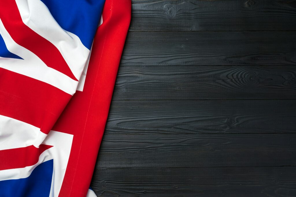 Flag of United Kingdom on wooden background