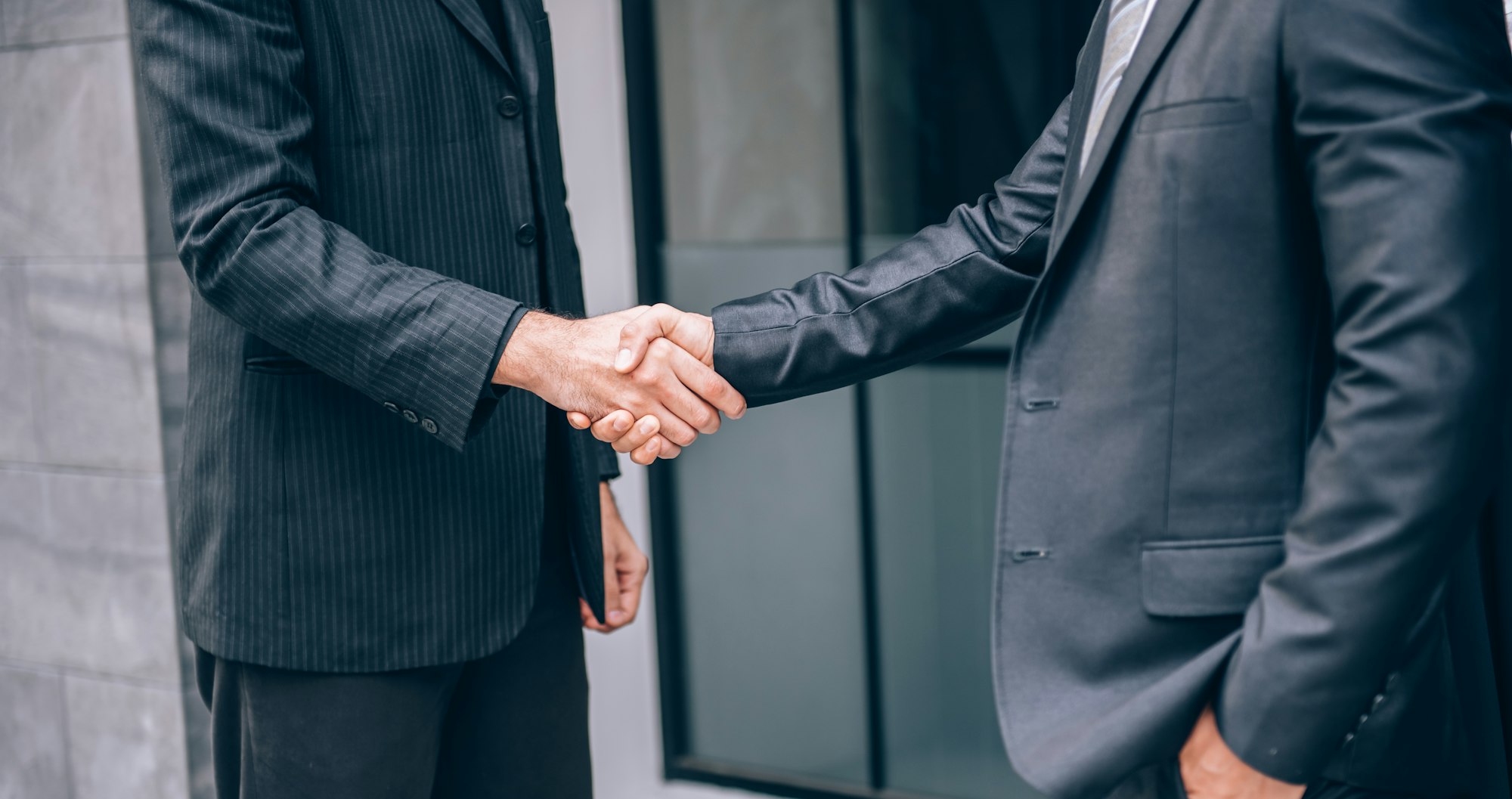 Business People Shaking Hands with Partnership