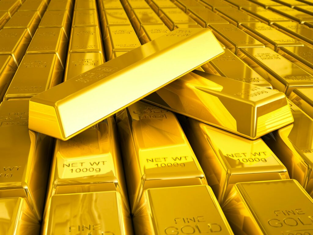 Stacks of gold bars close up