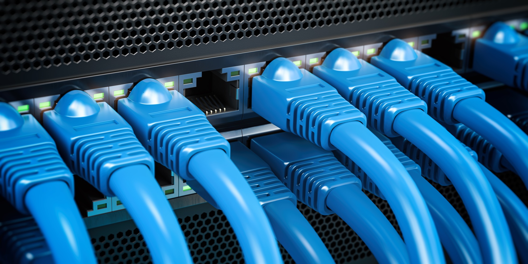 Network LAN internet cables connected in network switches. Server in data center.