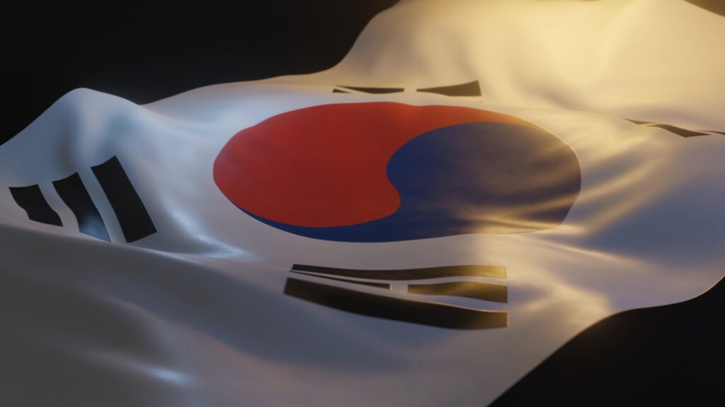 South Korea Flag Close up with Warm Lighting on Black Background