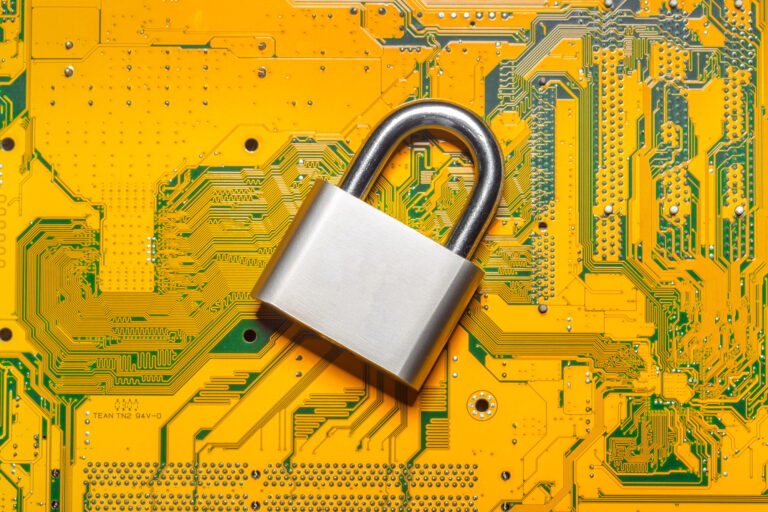 padlock on a computer circuit board