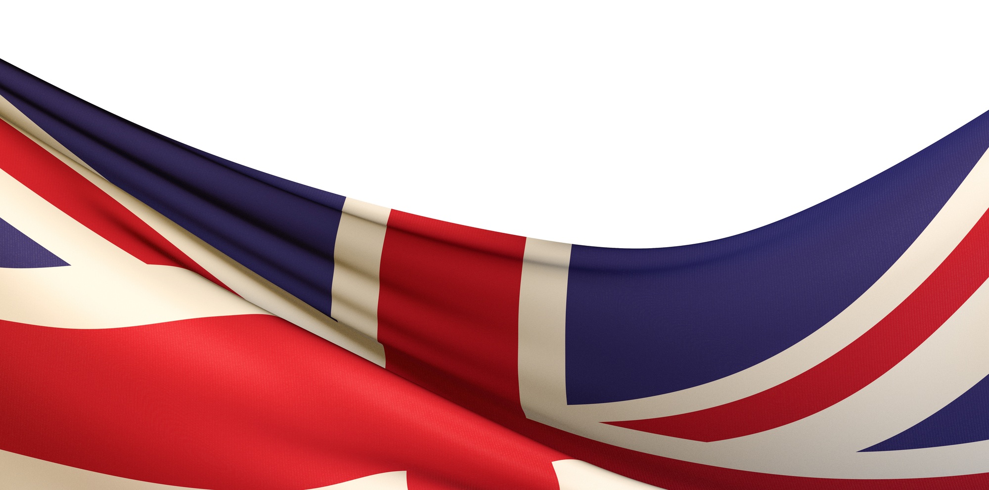 Closeup shot of a wavy flag of the UK under the lights isolated on a white background