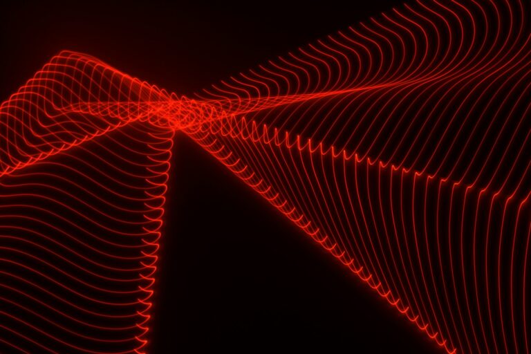 an abstract red and black background with wavy lines