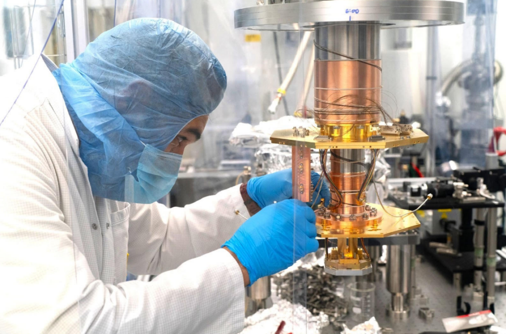 Scientist working with a quantum computing system in a laboratory environment.