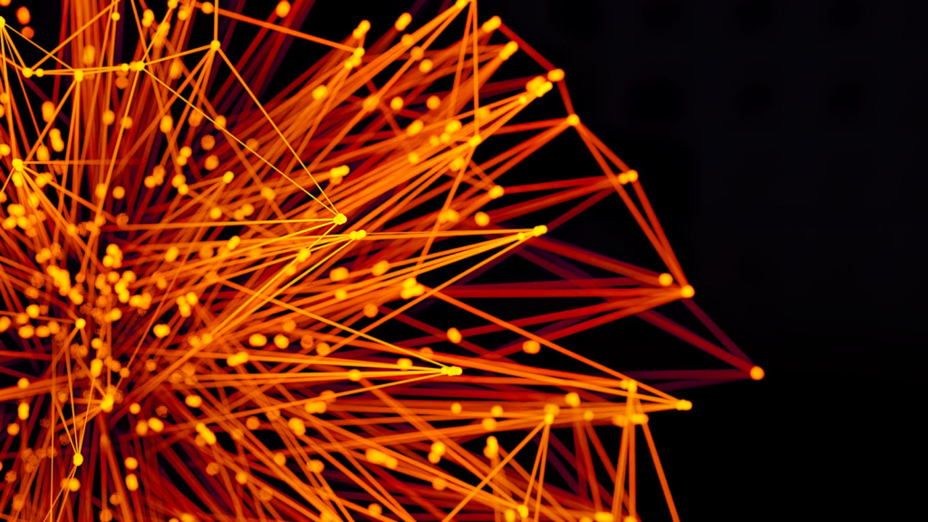 Vibrant orange lines and dots form an abstract network on a dark background, evoking technology and connectivity.