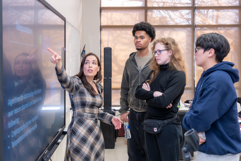 Fermilab scientist Silvia Zorzetti works with new students in the 2026 Saturday Morning Quantum program. Credit: Ryan Postel, Fermilab
