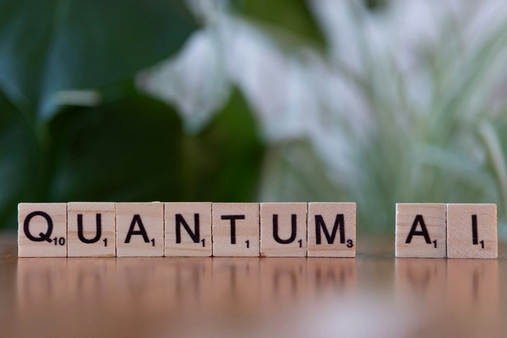 A close up of a wooden block with the word quantum written on it