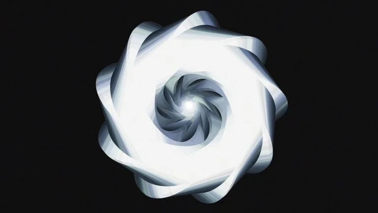 A luminous, spiraling design against black.