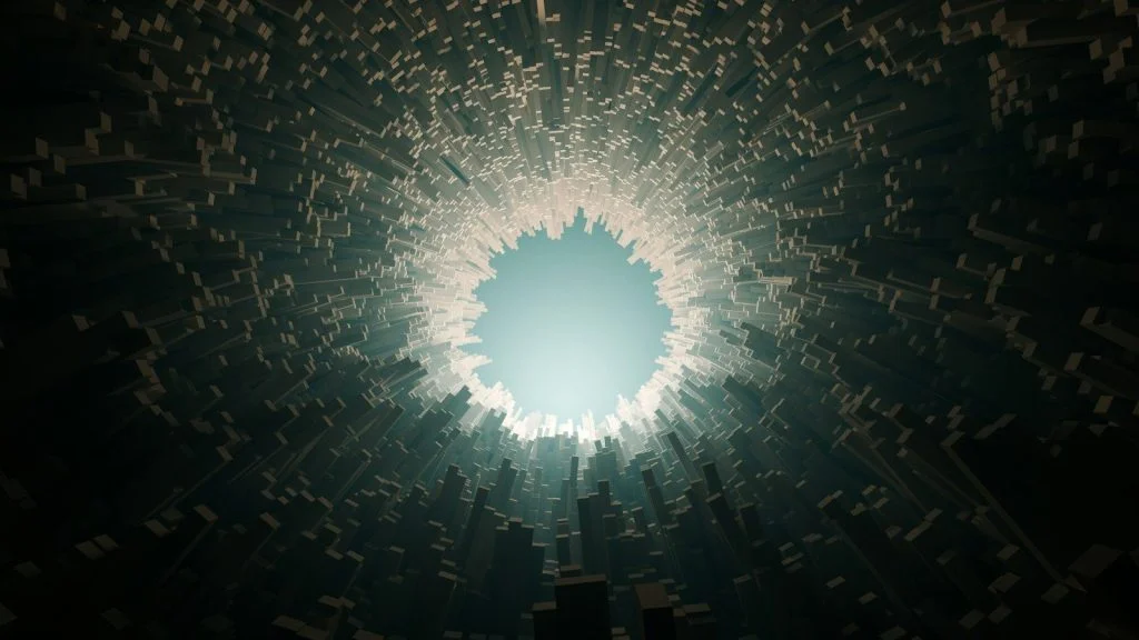 A dark tunnel of extruded rectangular blocks surrounding a bright central light source