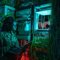 Military Young Woman Managing Server Network