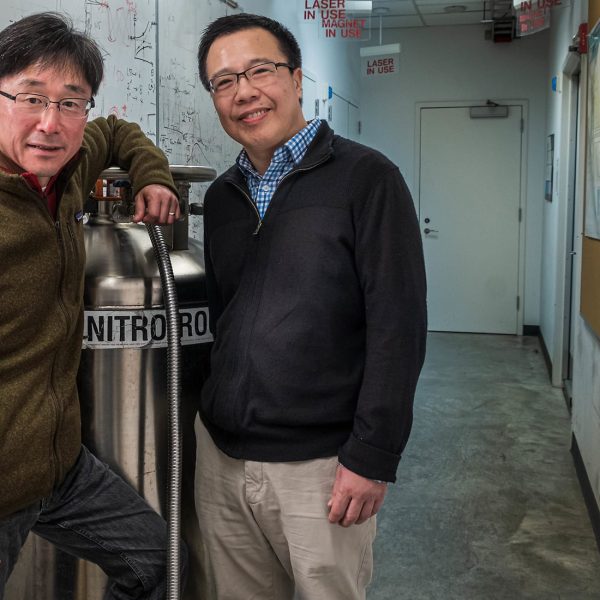 Junichiro Kono (left) and Qimiao Si in Kono’s Rice University laboratory in December 2019. (Photo by Jeff Fitlow/Rice University)